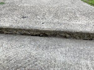 Uneven concrete repair with polyjacking/mudflapping
